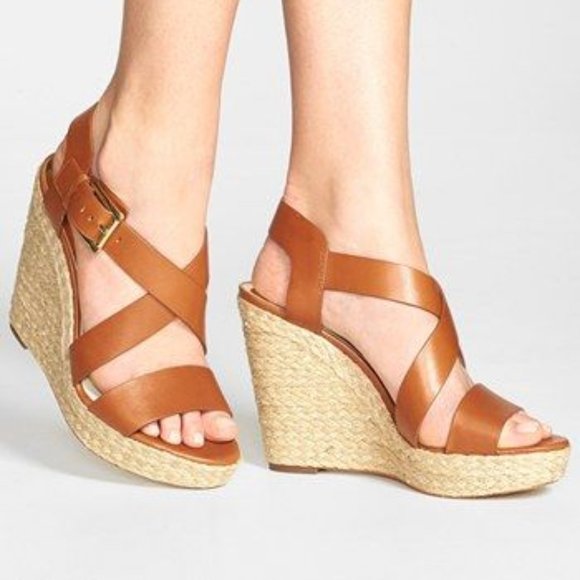 Michael Kors Shoes - New in Box Michael Kors Giovanna Luggage Wedges 7M